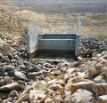 Transitional riprap apron downstream for a type VI stilling basin to prevent scour.