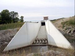 A photo taken from downstream of a SAF Stilling Basin.